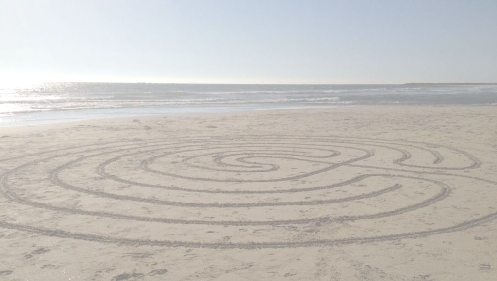 Beach labyrinth at height of the sun, created by and photo taken by OB Horak on beach in California.